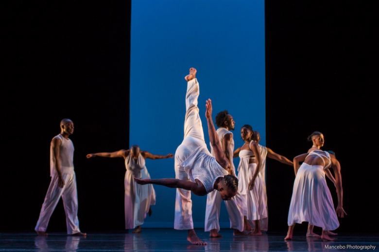 Group of Black dancers from the EVIDENCE, A Dance Company performing on stage.